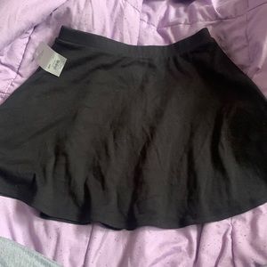 black skirt with zipper up the back